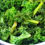 Homemade Air Fryer Kale Chips --ar 4:5 --sref https://s.mj.run/dDgajXskoRo --v 6.1 Job ID: eebcbadd-9955-4996-8a63-52991e39dea4 recipe photo