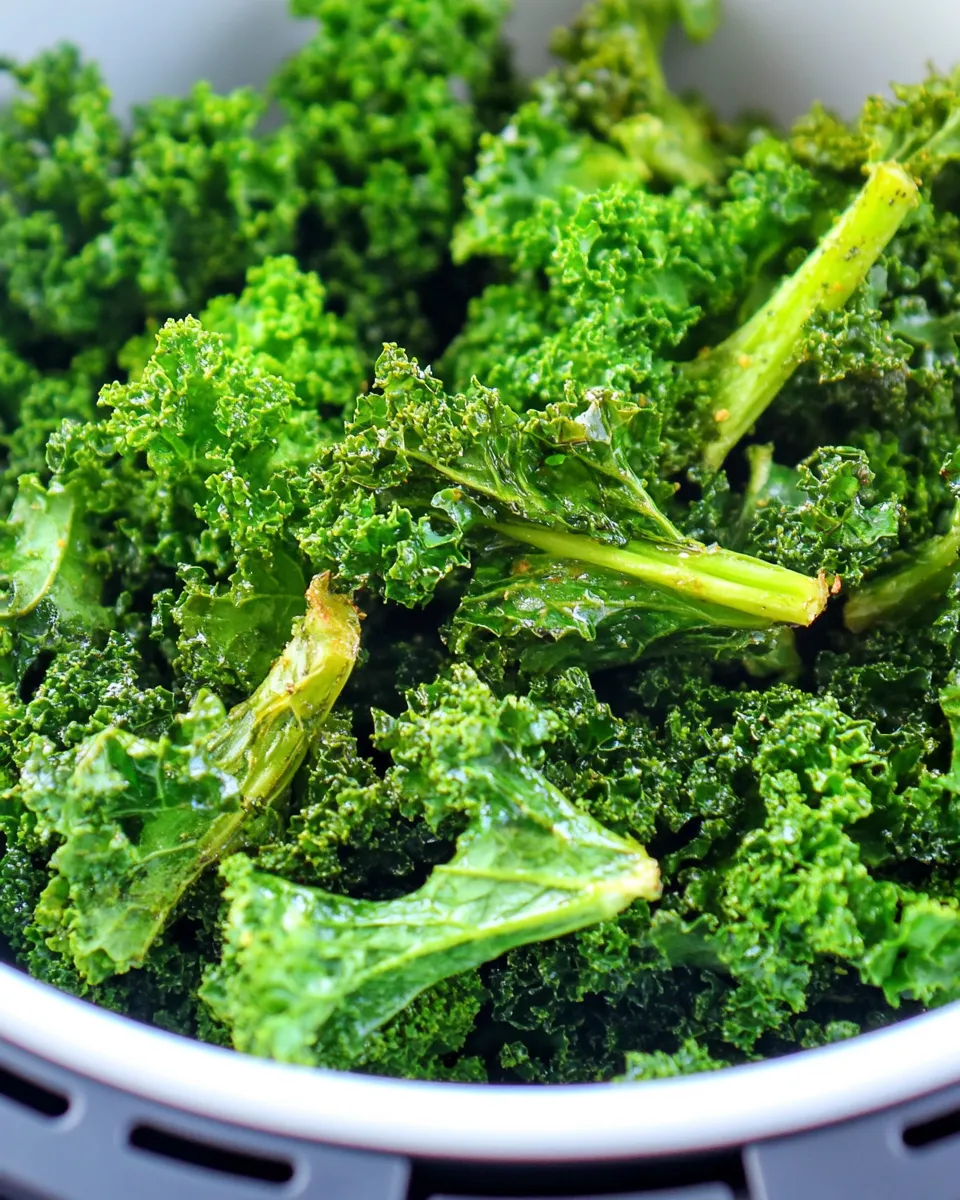Homemade Air Fryer Kale Chips --ar 4:5 --sref https://s.mj.run/dDgajXskoRo --v 6.1 Job ID: eebcbadd-9955-4996-8a63-52991e39dea4 recipe photo